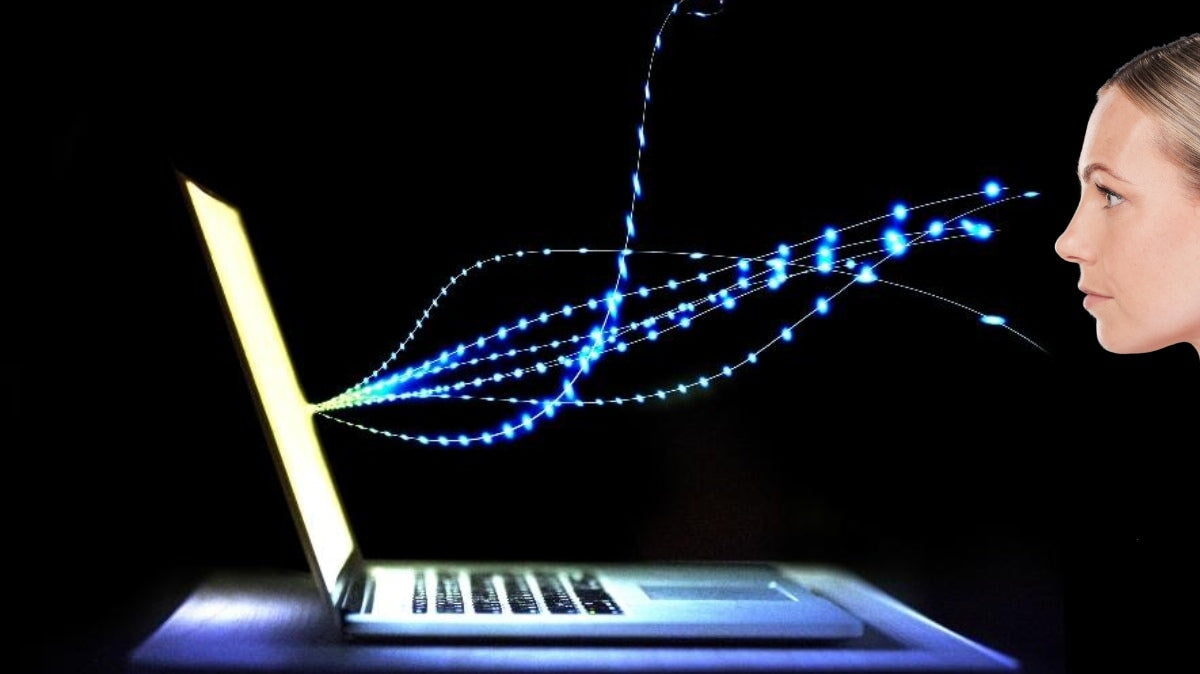 des lumières bleues explosent depuis un écran d’ordinateur