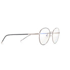 Lunettes anti lumière bleue rondes aux branches marrons, en métal argenté, de profil droit sur fond blanc. 